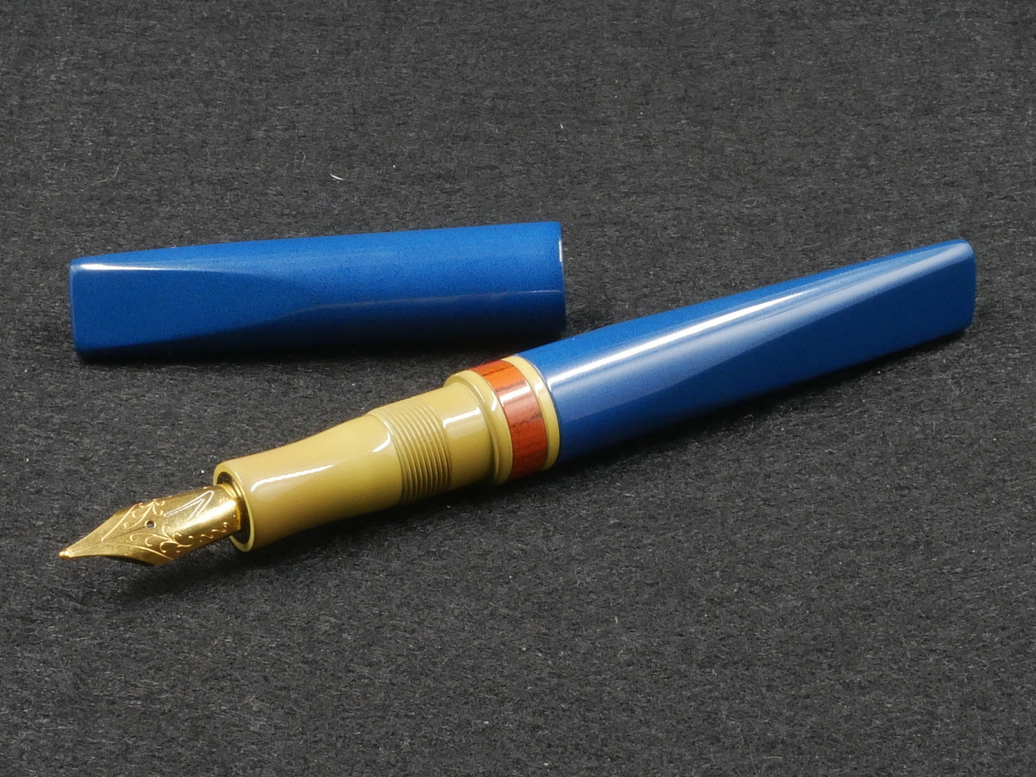 Prospector - Small - Nikko blue, SEM yellow, and NYH orange rippple ebonite - Jowo #6 nib