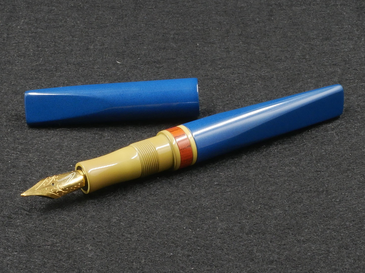 Prospector - Small - Nikko blue, SEM yellow, and NYH orange rippple ebonite - Jowo #6 nib