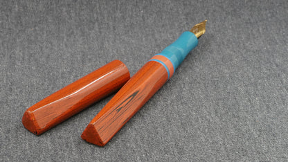 Prospector - Small - NYH orange woodgrain, blue and orange ebonites - Jowo #6 nib