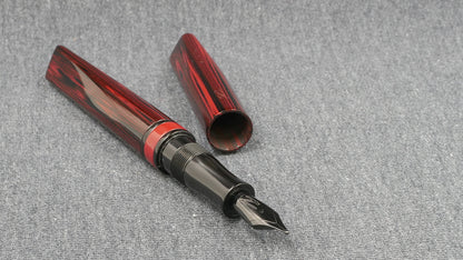 Prospector - Small - NYH red woodgrain, black adn red ebonites - Jowo #6 nib