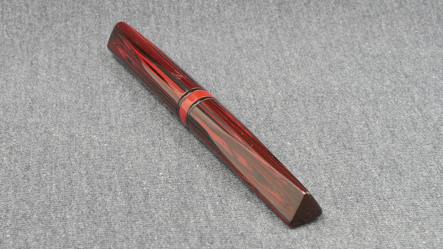 Prospector - Small - NYH red woodgrain, black adn red ebonites - Jowo #6 nib