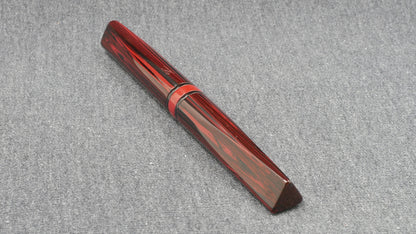 Prospector - Small - NYH red woodgrain, black adn red ebonites - Jowo #6 nib