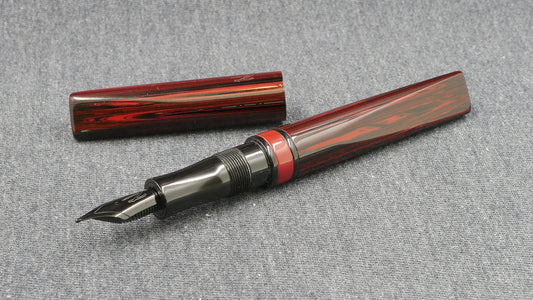 Prospector - Small - NYH red woodgrain, black adn red ebonites - Jowo #6 nib