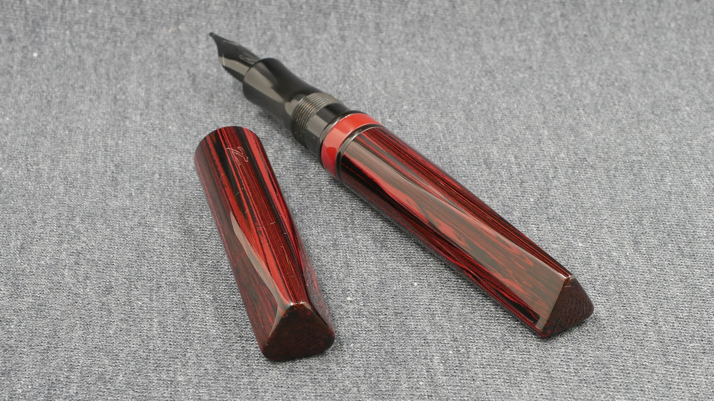 Prospector - Small - NYH red woodgrain, black adn red ebonites - Jowo #6 nib
