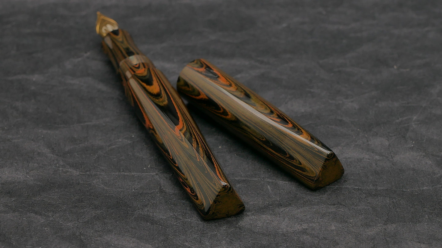 Prospector - Medium - Orange Ripple ebonite - #6 nib