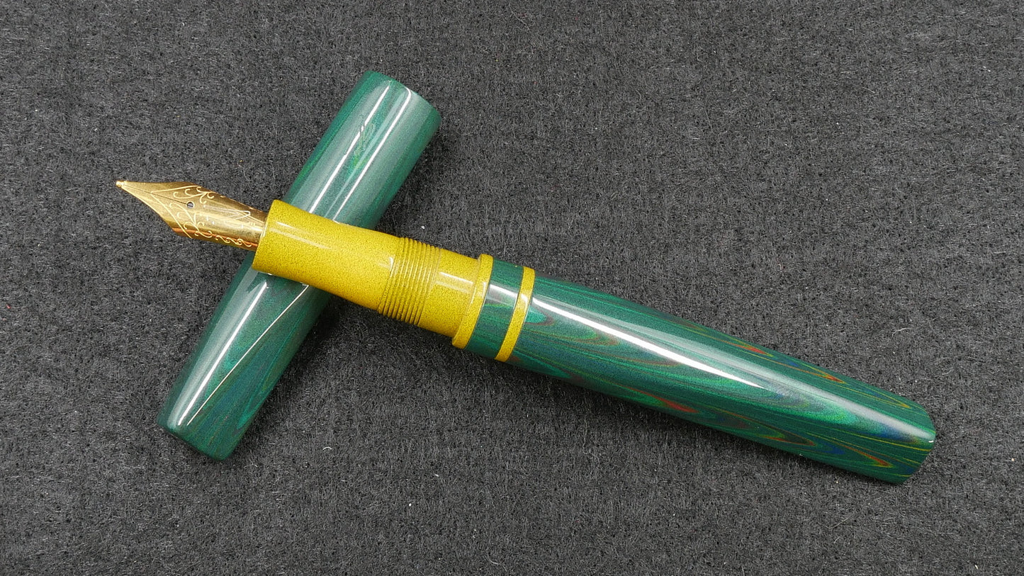 Prospector - Small - Nikko Dark Green ripple and solid yellow ebonite - Jowo #6 nib
