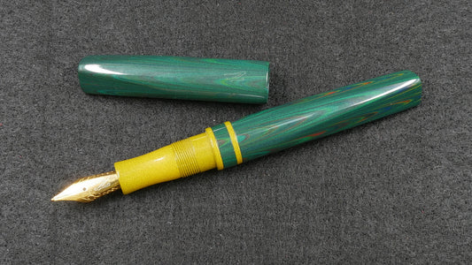 Prospector - Small - Nikko Dark Green ripple and solid yellow ebonite - Jowo #6 nib