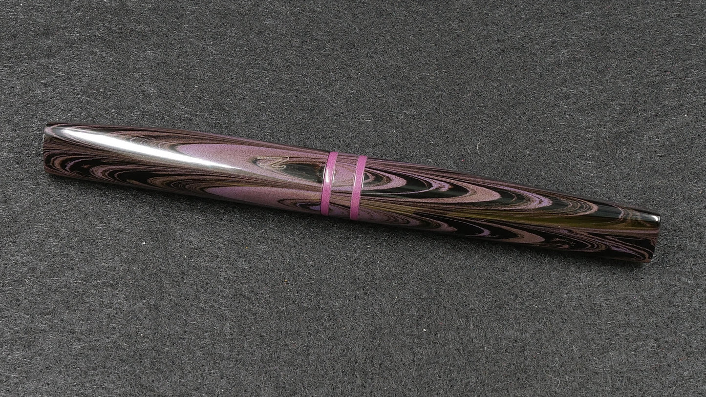Prospector - Small - Nikko purple ripple and solid purple ebonite - Jowo #6 nib