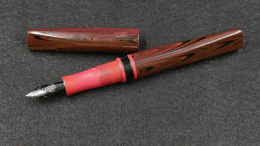 Prospector - Small - Nikko red ripple, solid red and black ebonite - Jowo #6 nib