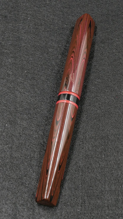 Prospector - Small - Nikko red ripple, solid red and black ebonite - Jowo #6 nib