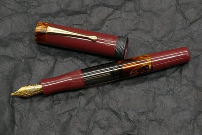 Orville - Medium - Corrl Creations Dark red and Tortoise resins, gray acrylic, knurled ring - clip - piston - #6 nib