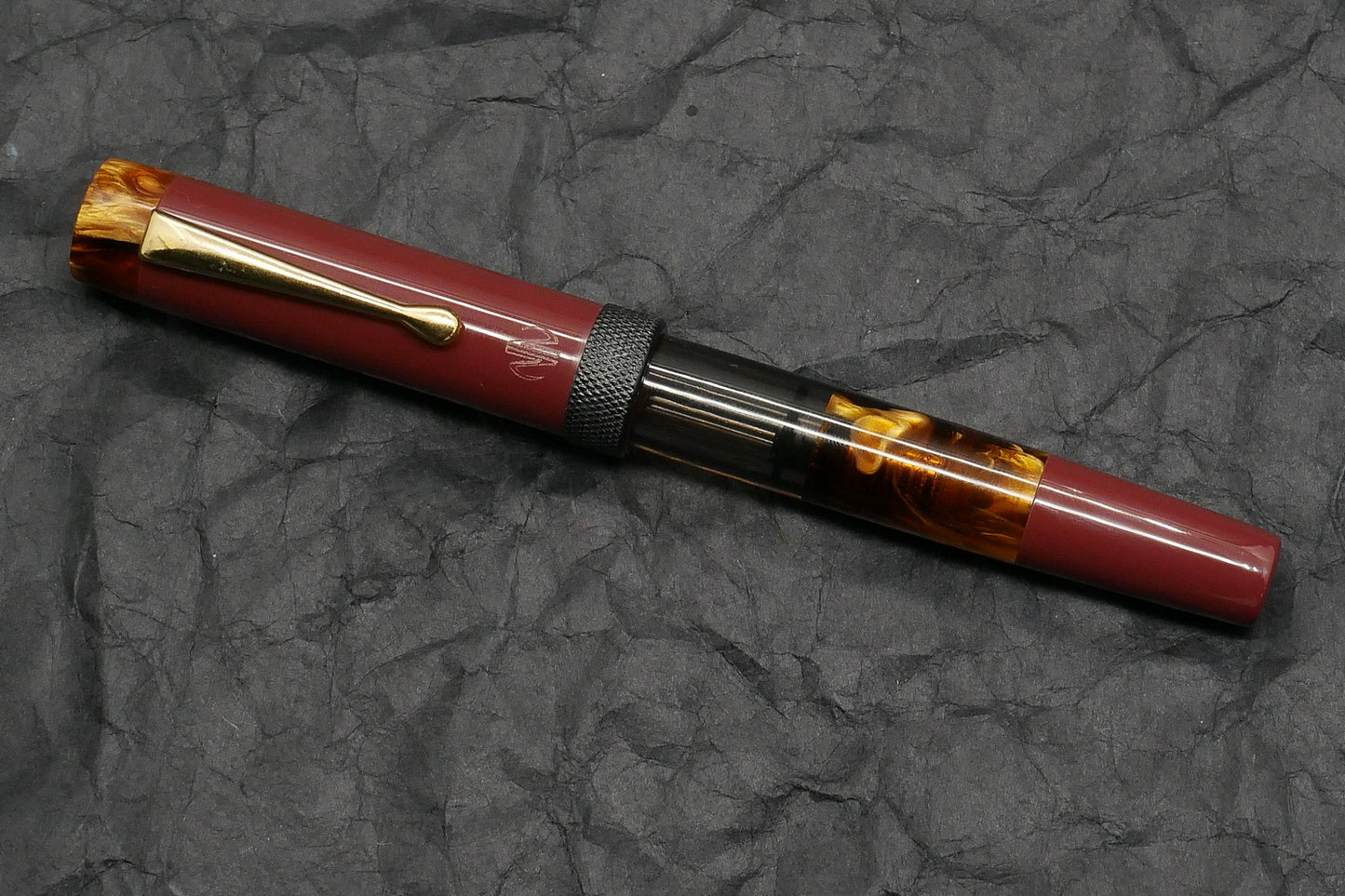 Orville - Medium - Corrl Creations Dark red and Tortoise resins, gray acrylic, knurled ring - clip - piston - #6 nib