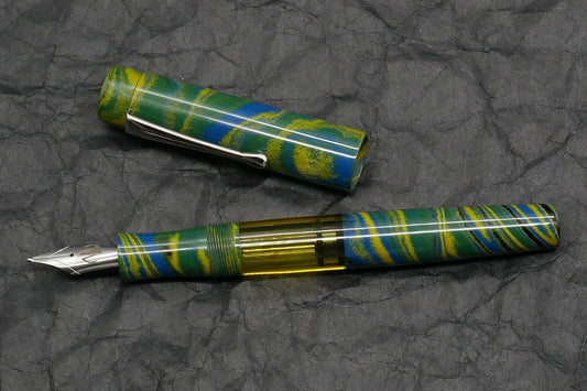 Orville - Medium - Tropical ebonite, yellow acrylic - clip - piston - #6 nib