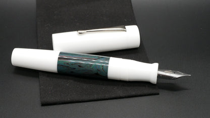 Orville - oversize - White and Deep Sea ripple ebonite, doublet - clip - #6 nib