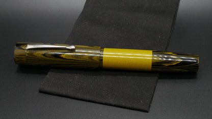 Orville - oversize - Yellow ripple and solid ebonite, doublet - clip - #6 nib