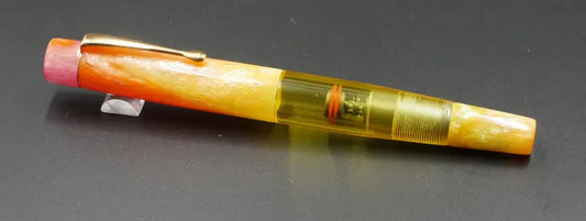 Townsend - Medium – D Squared Arkansas Sunset, clear yellow - clip -  Piston - #6 nib