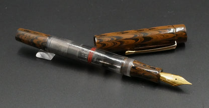 Orville - Small - Brown ebonite, clear gray with a cool smudge acrylic - clip - piston - #6 nib