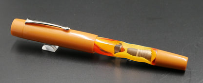 Orville - Medium - Solid light orange and clown water acrylic - clip - piston - #6 nib