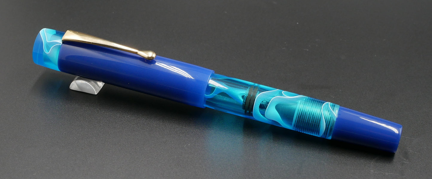 Orville - Medium - Solid blue and blue water acrylics - clip - piston - #6 nib