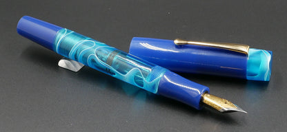 Orville - Medium - Solid blue and blue water acrylics - clip - piston - #6 nib