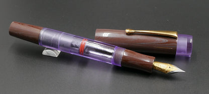 Orville - Medium -  Nikko Purple/Pink ebonite and clear purple acrylic - clip - piston - #6 nib