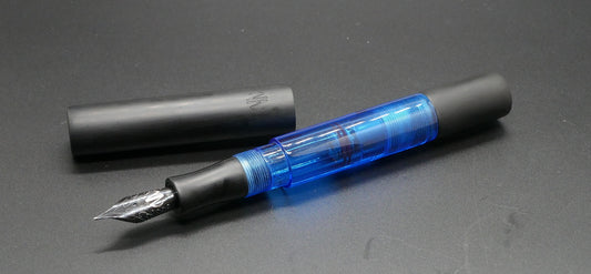 Eastman - Small – Matte black ebonite and clear blue acrylic - piston - #6 nib